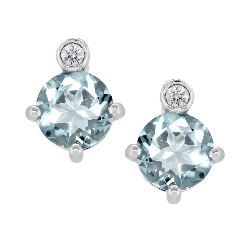 Silver Stud Earrings-STERLING SILVER STUDS WITH PALE BLUE TOPAZ AND LAB GROWN DIAMOND ACCENTS, .02 CT TW